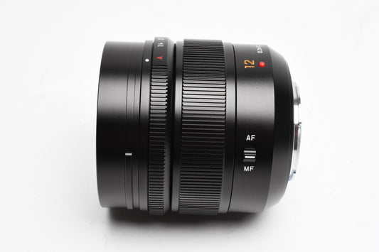 Panasonic Lumix Leica DG Summilux 12mm f1.4 w/hood, caps, pouch, Mint-