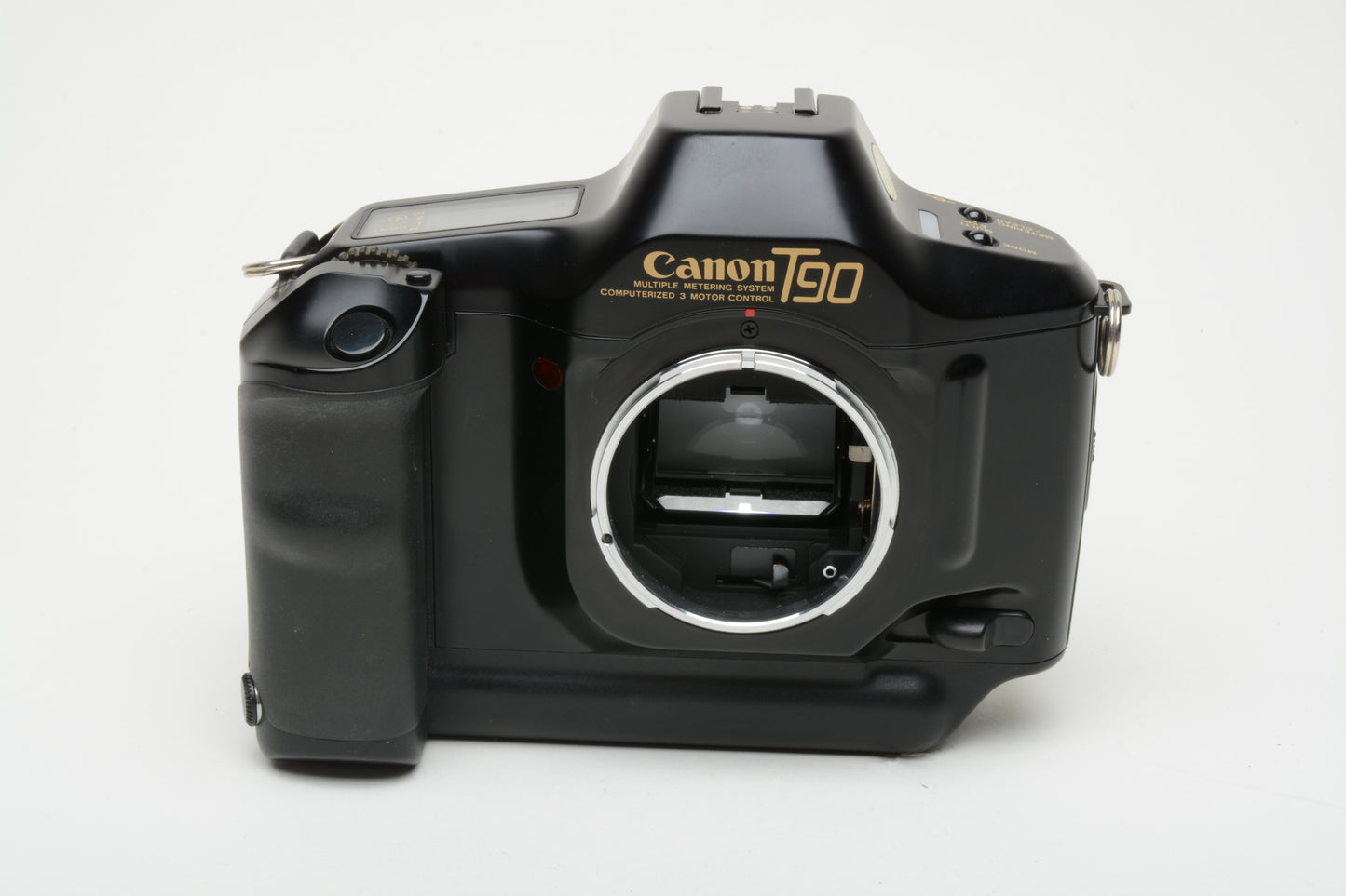 Canon T90 35mm SLR body, strap, cap, strap, tested, works great!  Clean