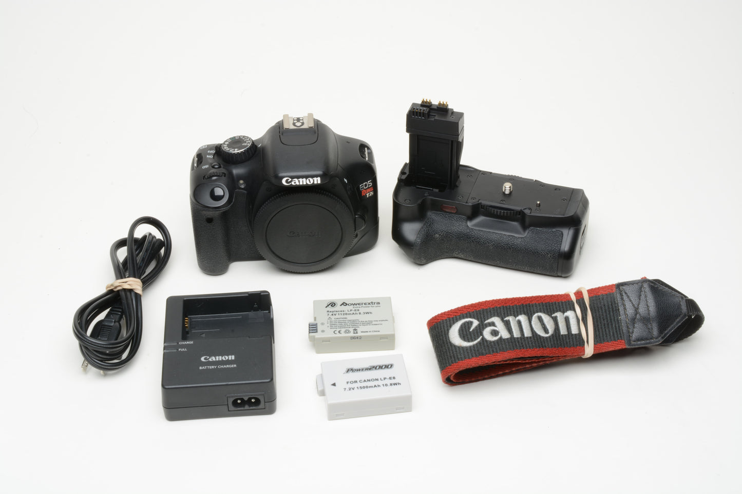 Canon EOS T2i DSLR body w/battery grip, 2batts, charger, 29K acts, nice, tested