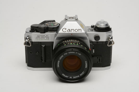 Canon AE-1 Program 35mm SLR Camera w/50mm f/1.8, strap, New Seals, case, tested