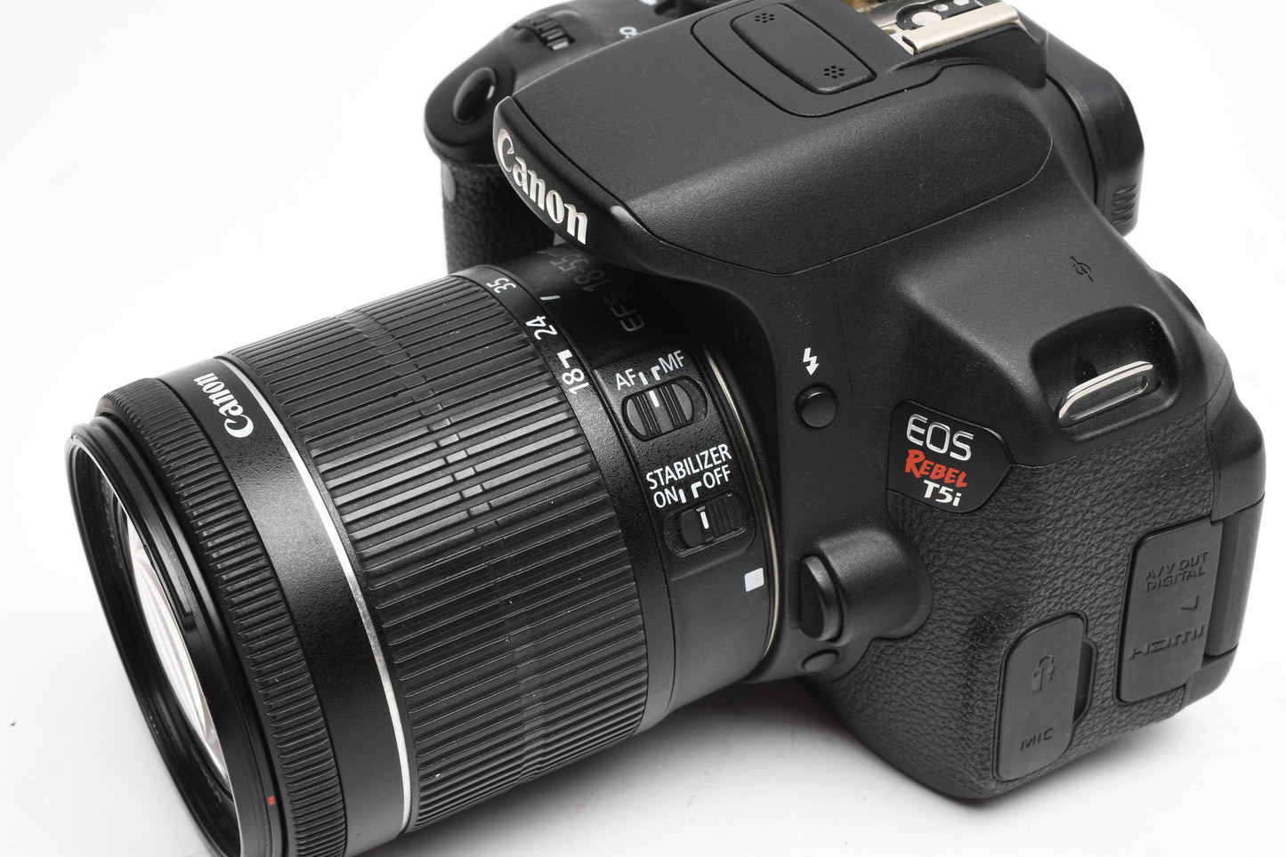 Canon EOS Rebel T5i DSLR w/18-55mm f3.5-5.6 IS STN zoom, 33K Acts
