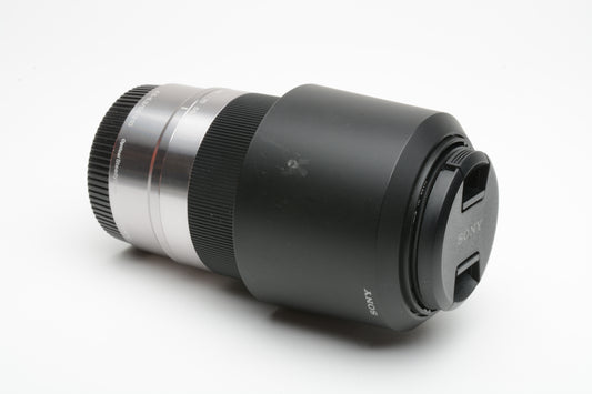 Sony 55-210mm f4.5-6.3 OSS zoom lens (Silver) w/Lens caps + Lens hood + UV filter