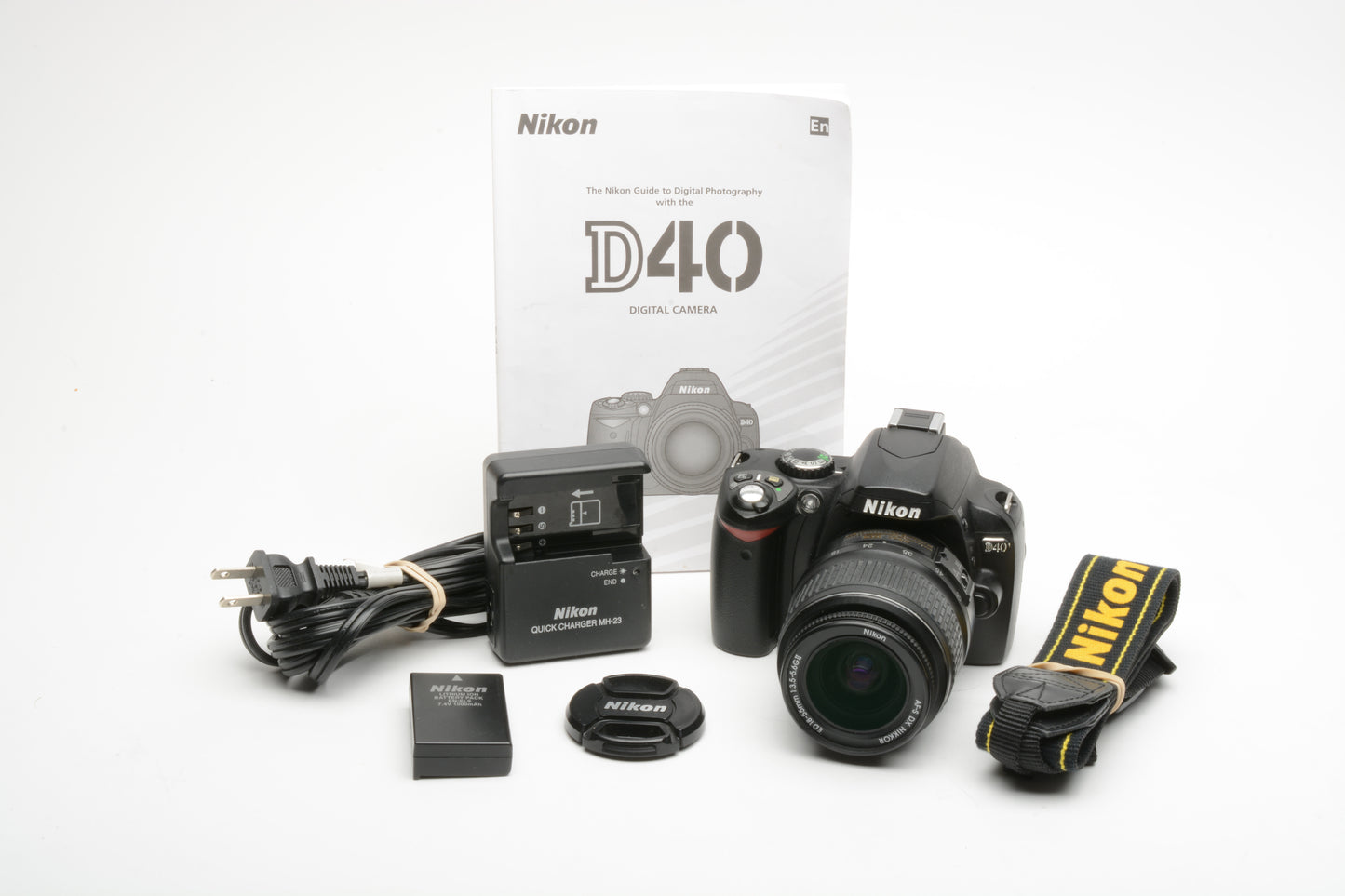 Nikon D40 DSLR body w/Nikkor 18-55mm f3.5-5.6G II ED, batt+charger, 4554 Acts