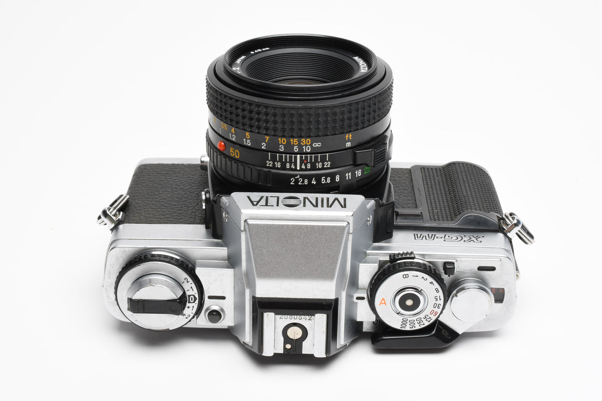 Minolta XG-M 35mm SLR w/50mm f2 lens, strap, new seals, cap, UV, Nice