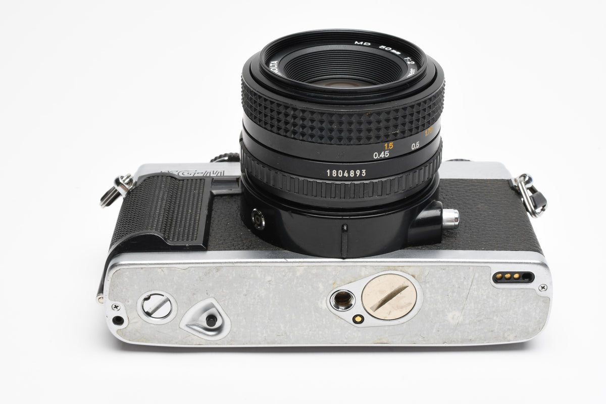 Minolta XG-M 35mm SLR w/50mm f2 lens, strap, new seals, cap, UV, Nice