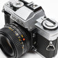 Minolta XG-M 35mm SLR w/50mm f2 lens, strap, new seals, cap, UV, Nice