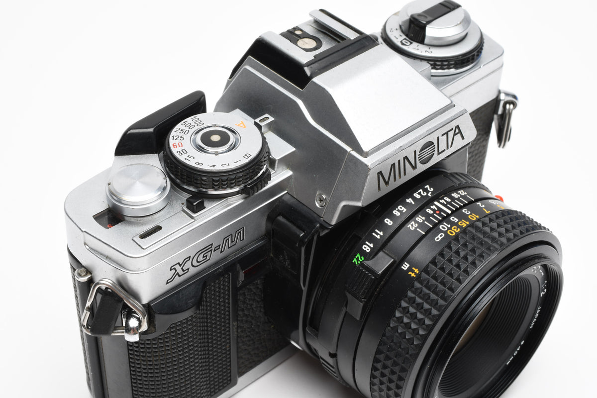 Minolta XG-M 35mm SLR w/50mm f2 lens, strap, new seals, cap, UV, Nice