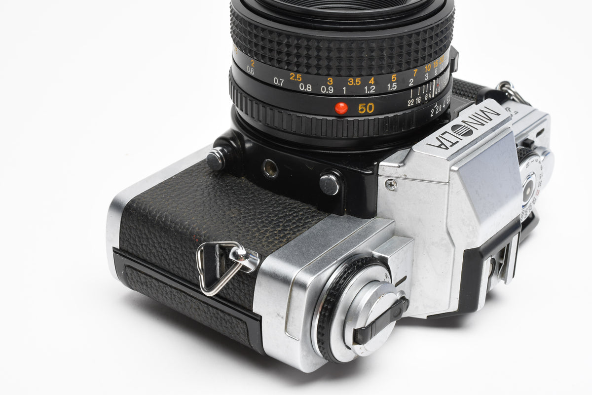 Minolta XG-M 35mm SLR w/50mm f2 lens, strap, new seals, cap, UV, Nice