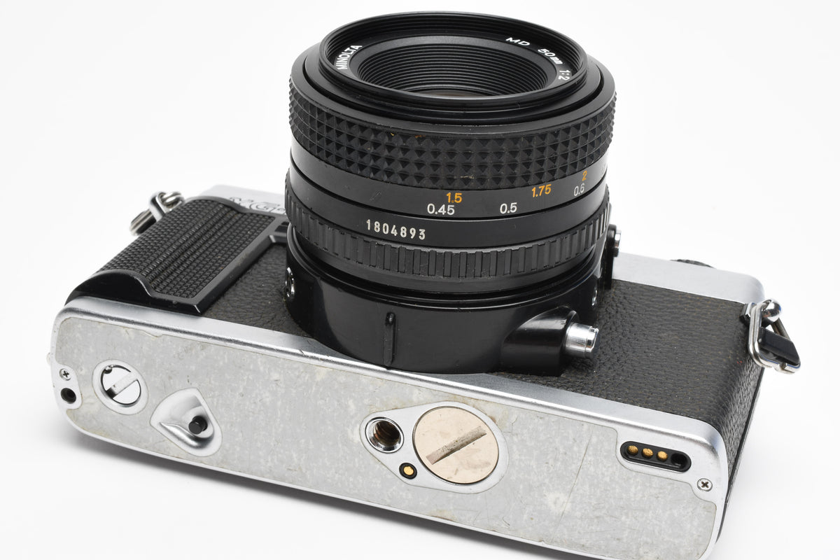 Minolta XG-M 35mm SLR w/50mm f2 lens, strap, new seals, cap, UV, Nice