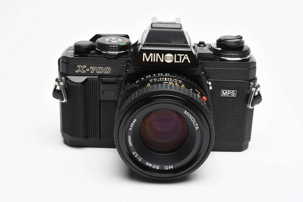 Minolta X700 35mm SLR w/50mm f1.7 lens, strap, cap, Sky, new seals, Nice!