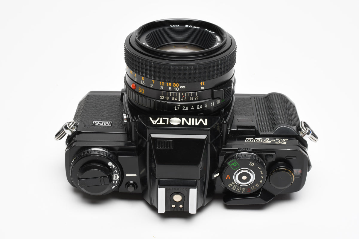 Minolta X700 35mm SLR w/50mm f1.7 lens, strap, cap, Sky, new seals, Nice!