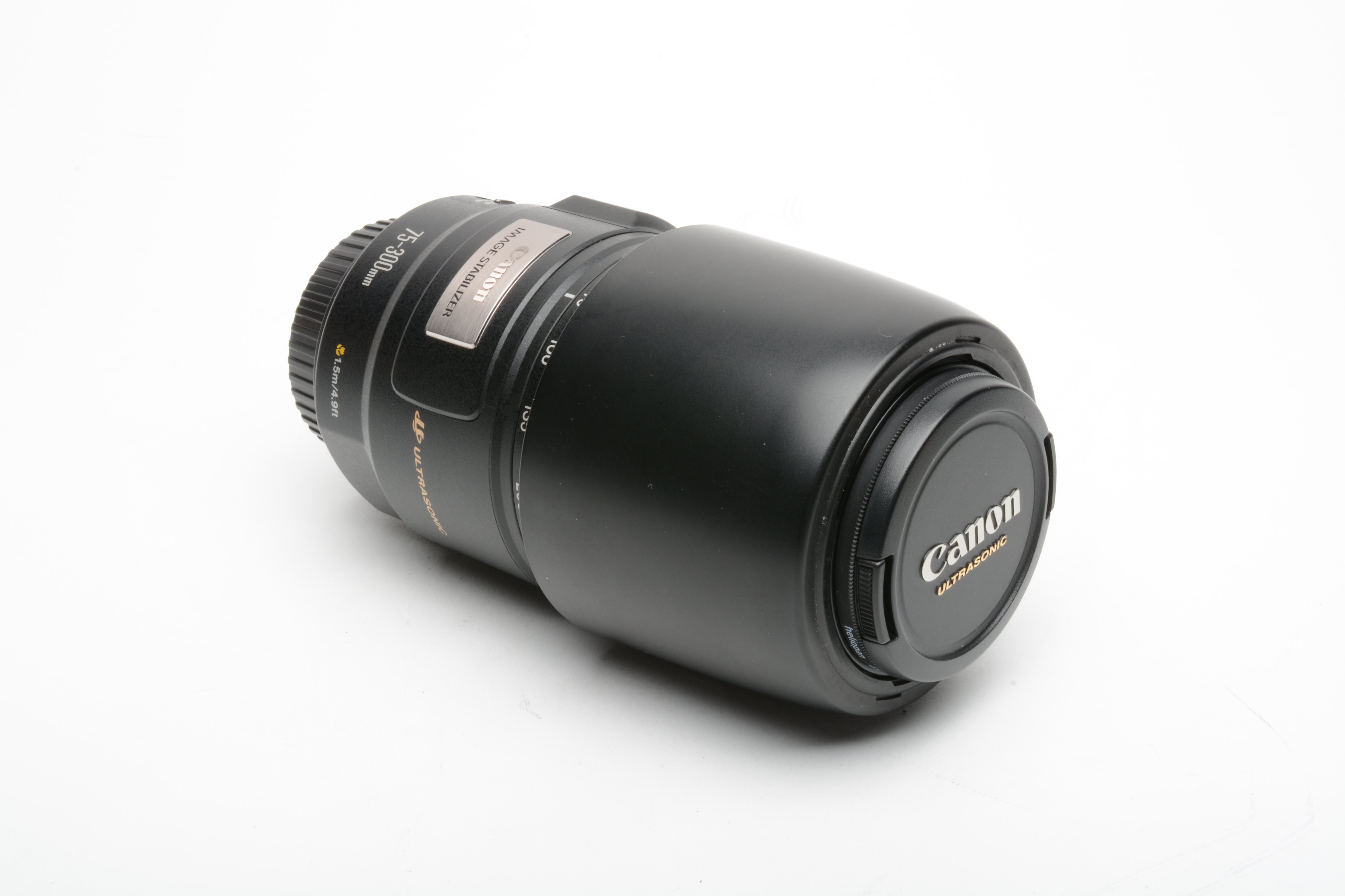 Canon EF 75-300mm IS F4-5.6 zoom lens, Heliopan UV, caps, clean