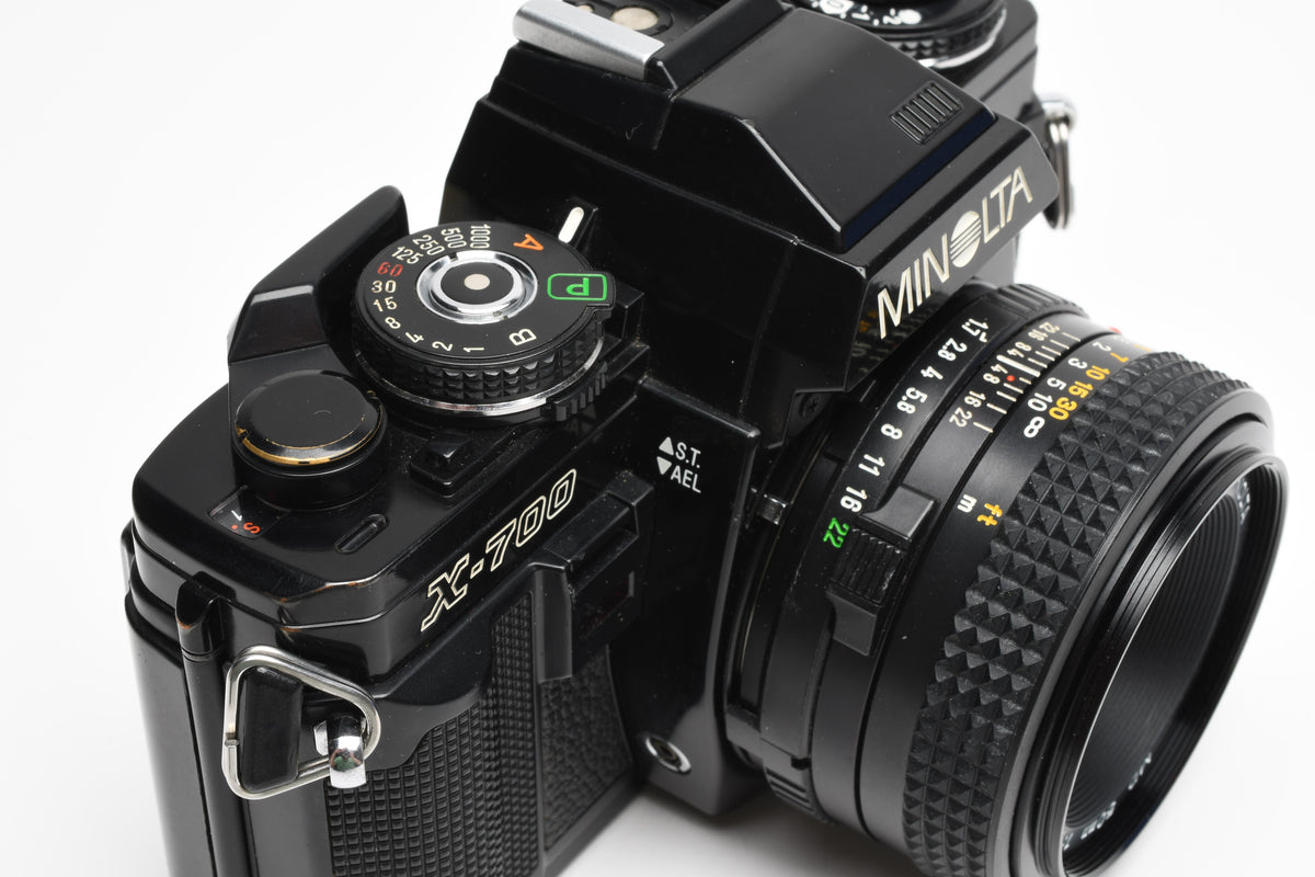 Minolta X700 35mm SLR w/50mm f1.7 lens, strap, cap, Sky, new seals, Nice!