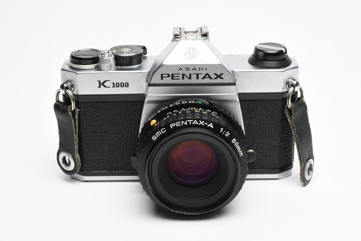 Pentax K1000 35mm SLR w/50mm f2 lens, New seals, strap, Great!