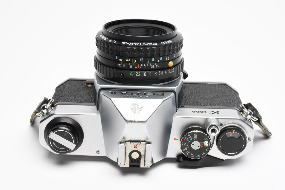 Pentax K1000 35mm SLR w/50mm f2 lens, New seals, strap, Great!