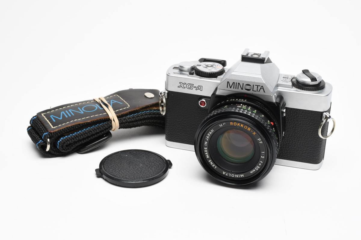 Minolta XG-A 35mm SLR w/50mm f2 lens, strap, new seals, cap, Great!