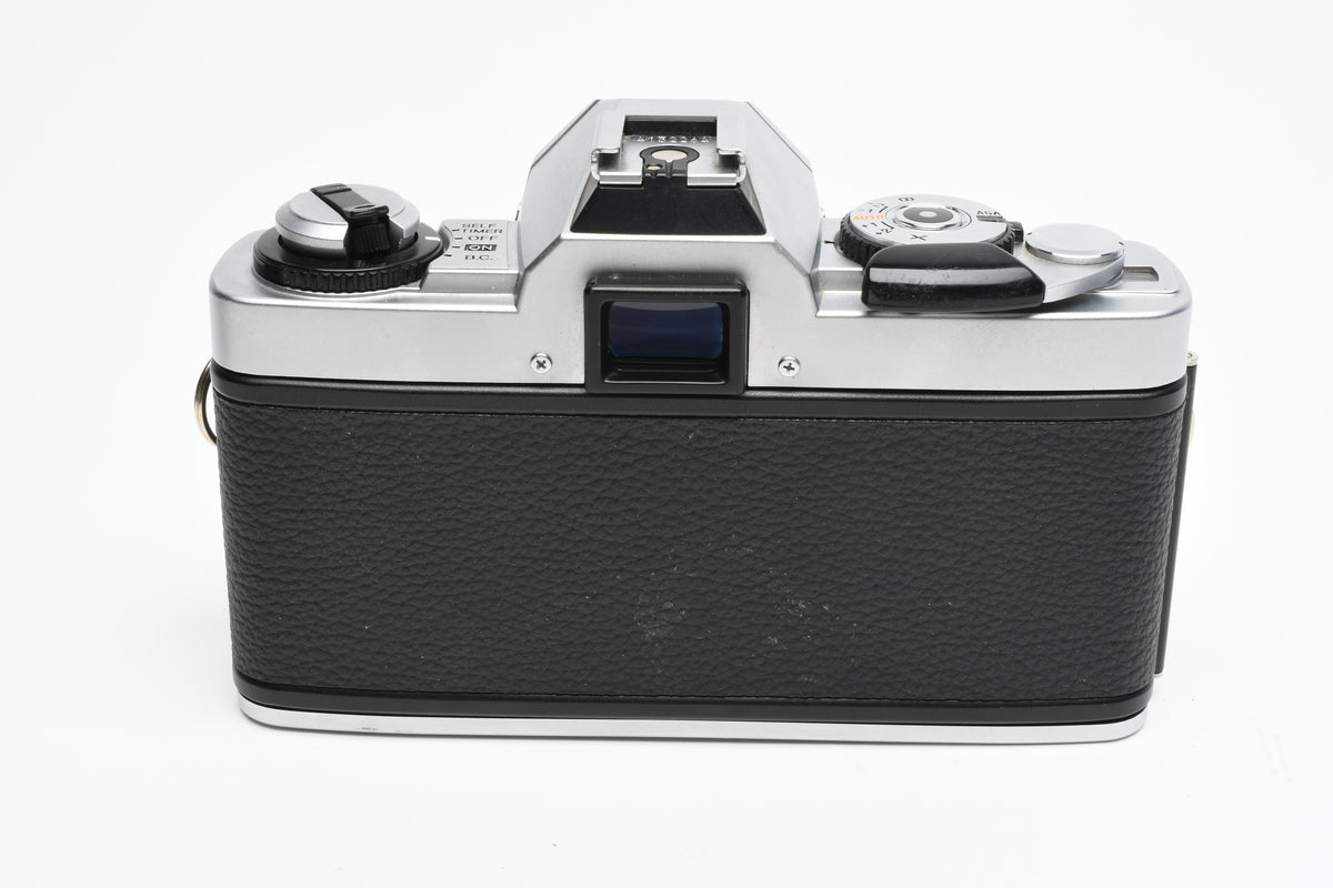 Minolta XG-A 35mm SLR w/50mm f2 lens, strap, new seals, cap, Great!