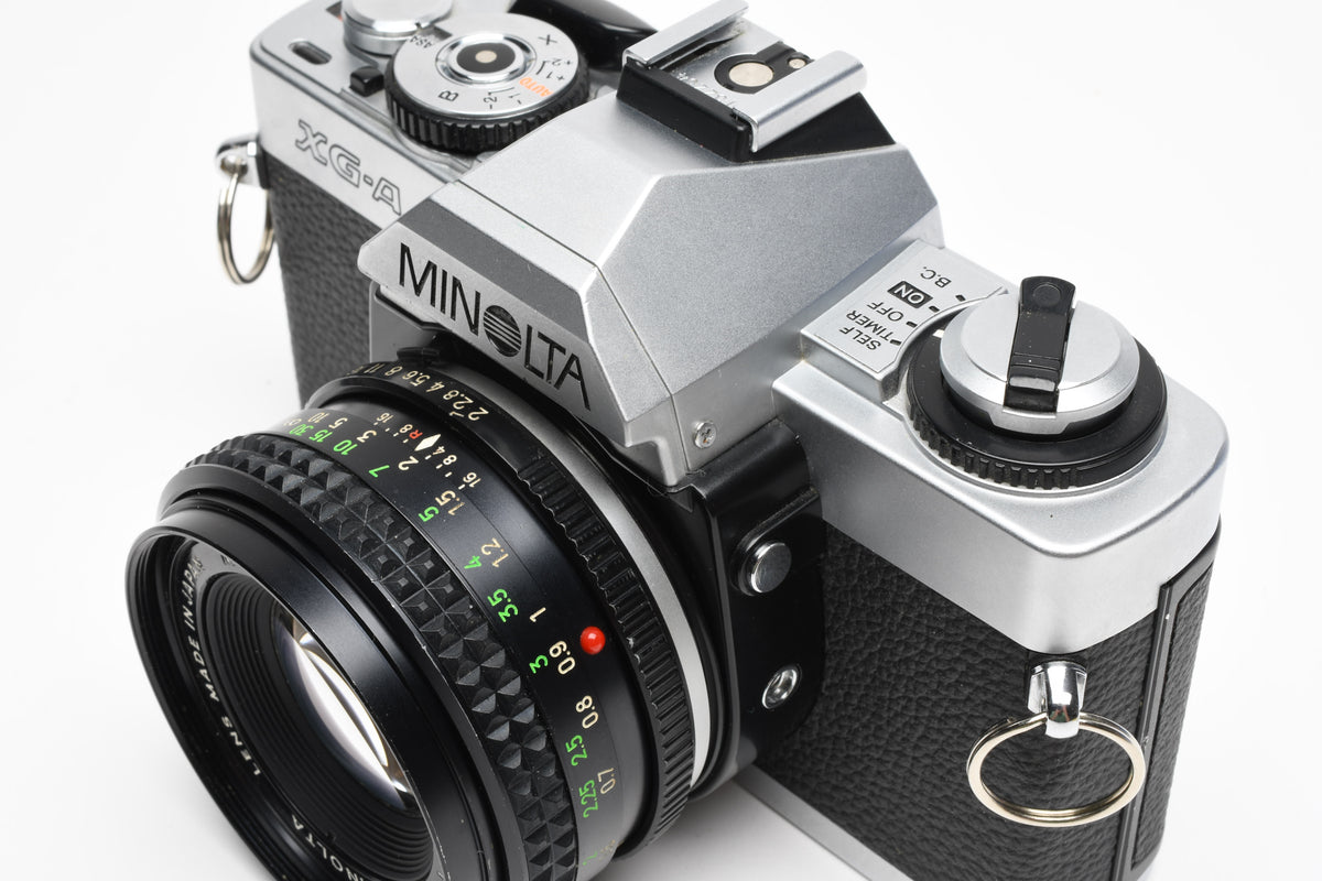 Minolta XG-A 35mm SLR w/50mm f2 lens, strap, new seals, cap, Great!
