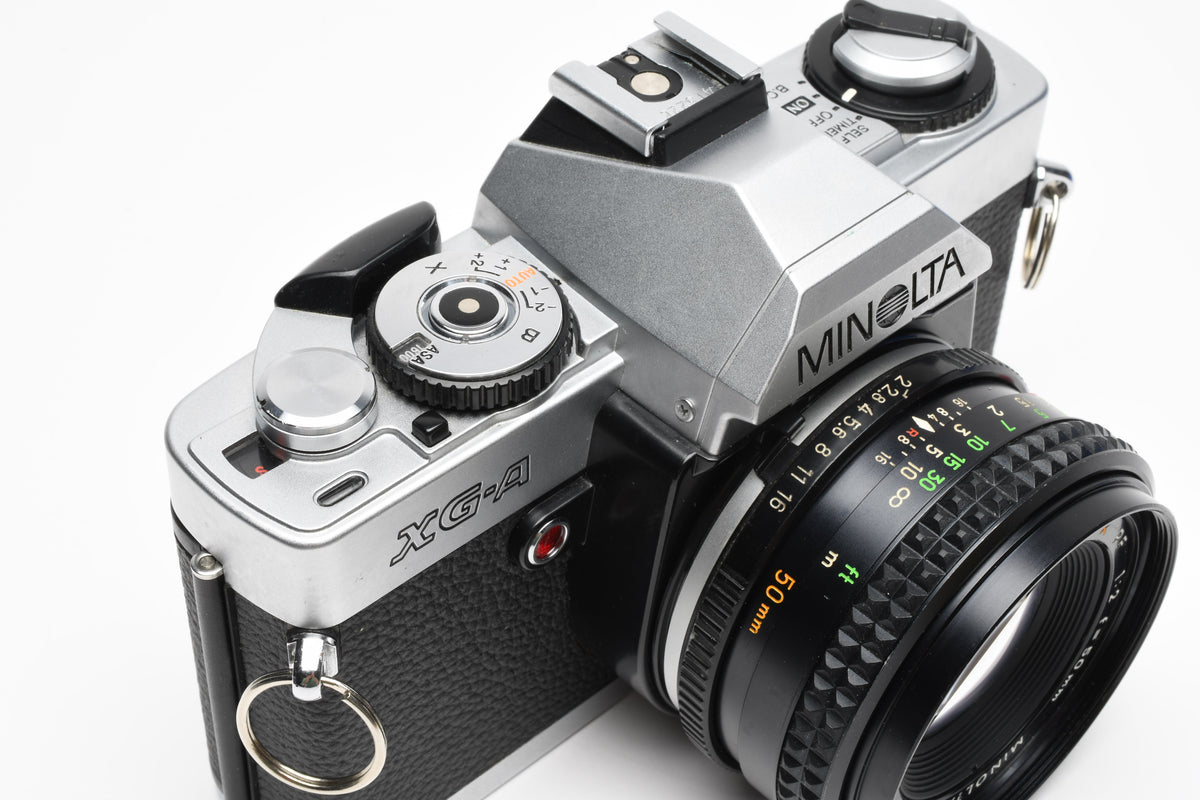 Minolta XG-A 35mm SLR w/50mm f2 lens, strap, new seals, cap, Great!