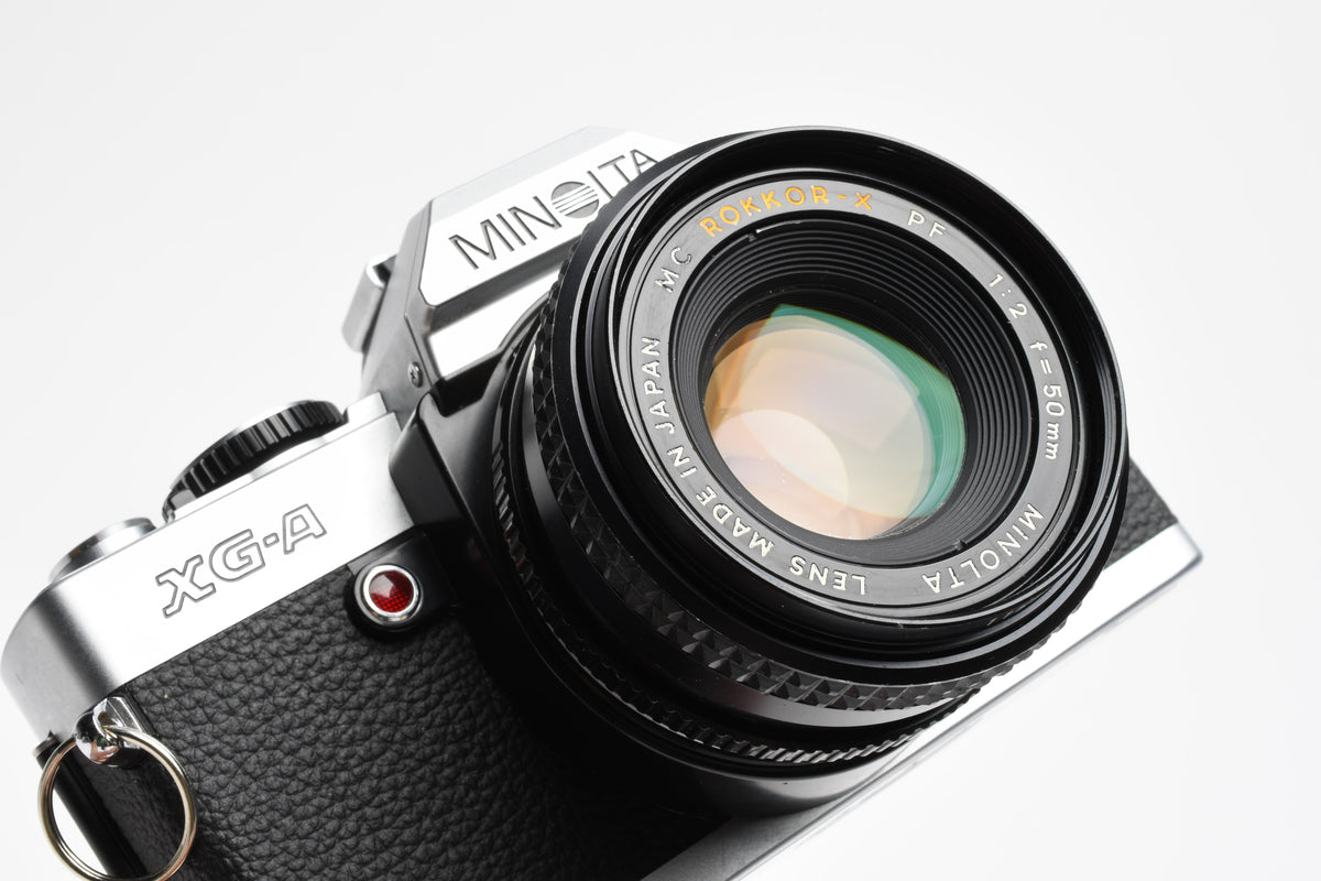Minolta XG-A 35mm SLR w/50mm f2 lens, strap, new seals, cap, Great!