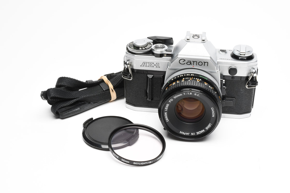 Canon AE-1 35mm SLR Camera w/50mm f1.8 Lens, UV, New Seals! Great!