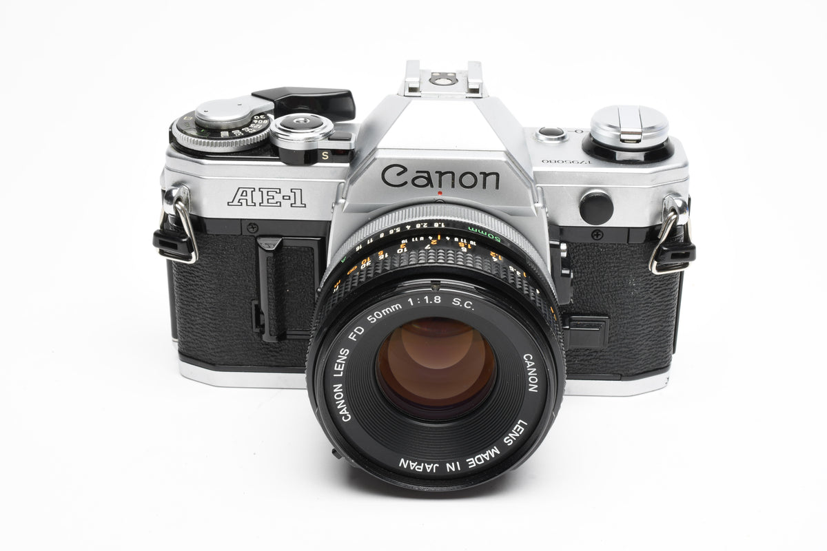 Canon AE-1 35mm SLR Camera w/50mm f1.8 Lens, UV, New Seals! Great!
