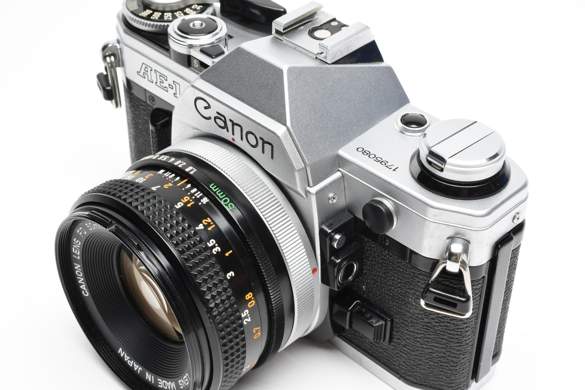 Canon AE-1 35mm SLR Camera w/50mm f1.8 Lens, UV, New Seals! Great!