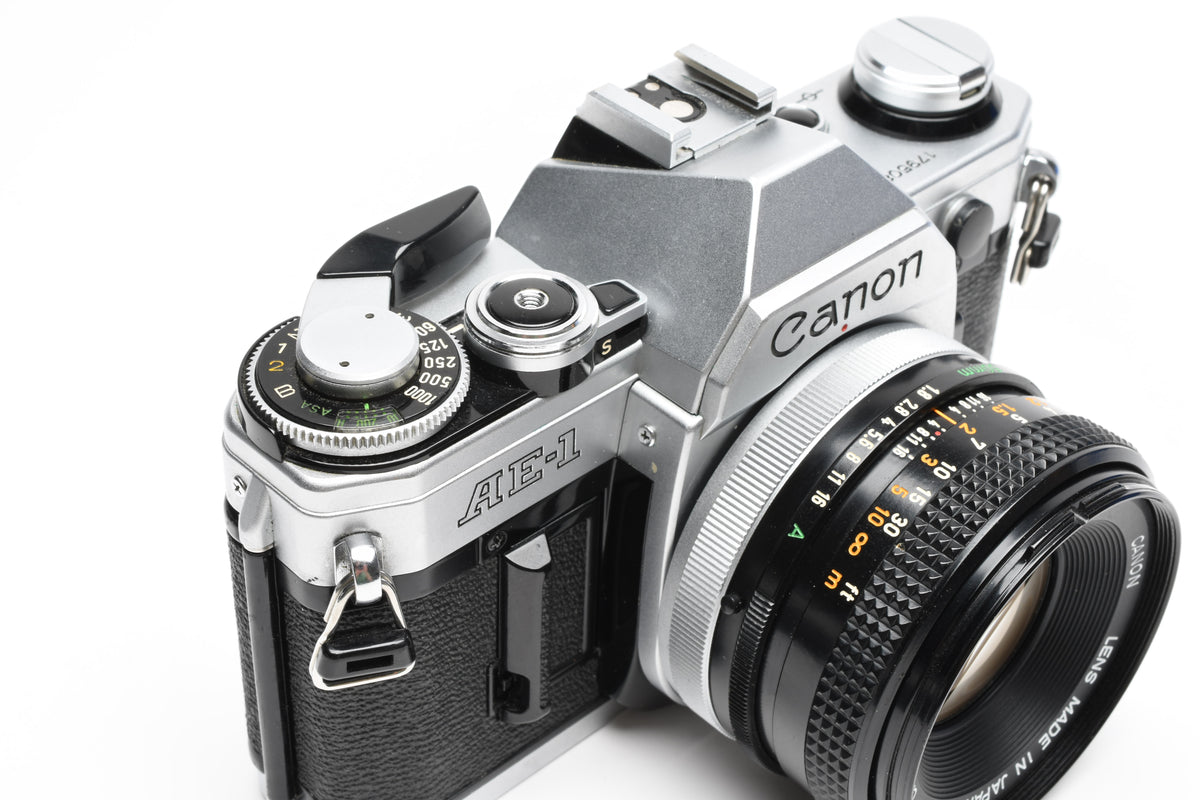 Canon AE-1 35mm SLR Camera w/50mm f1.8 Lens, UV, New Seals! Great!
