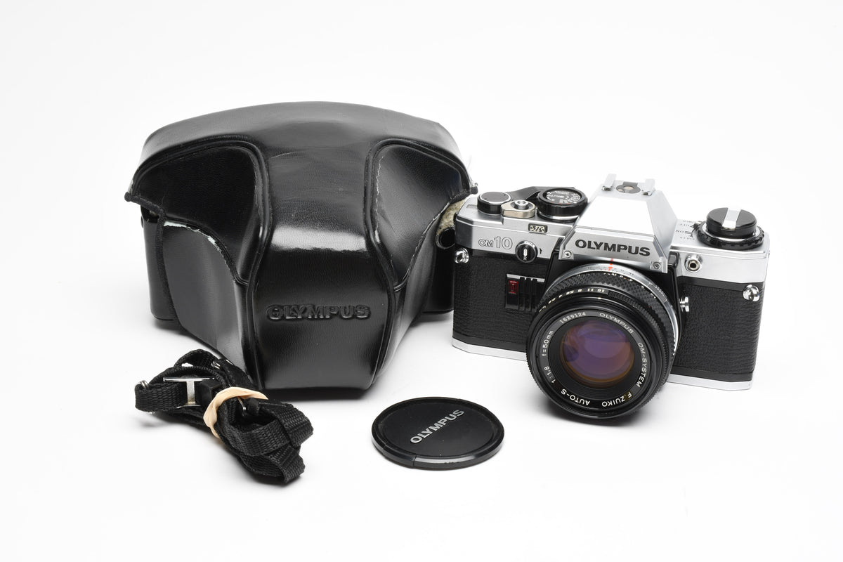 Olympus OM10 35mm SLR Body w/50mm f1.8 lens, Case, New seals, Great!