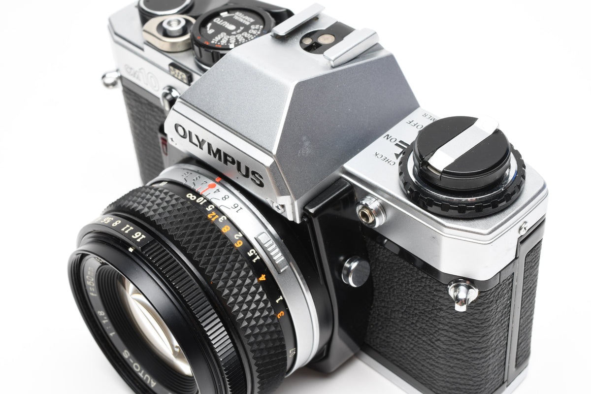 Olympus OM10 35mm SLR Body w/50mm f1.8 lens, Case, New seals, Great!