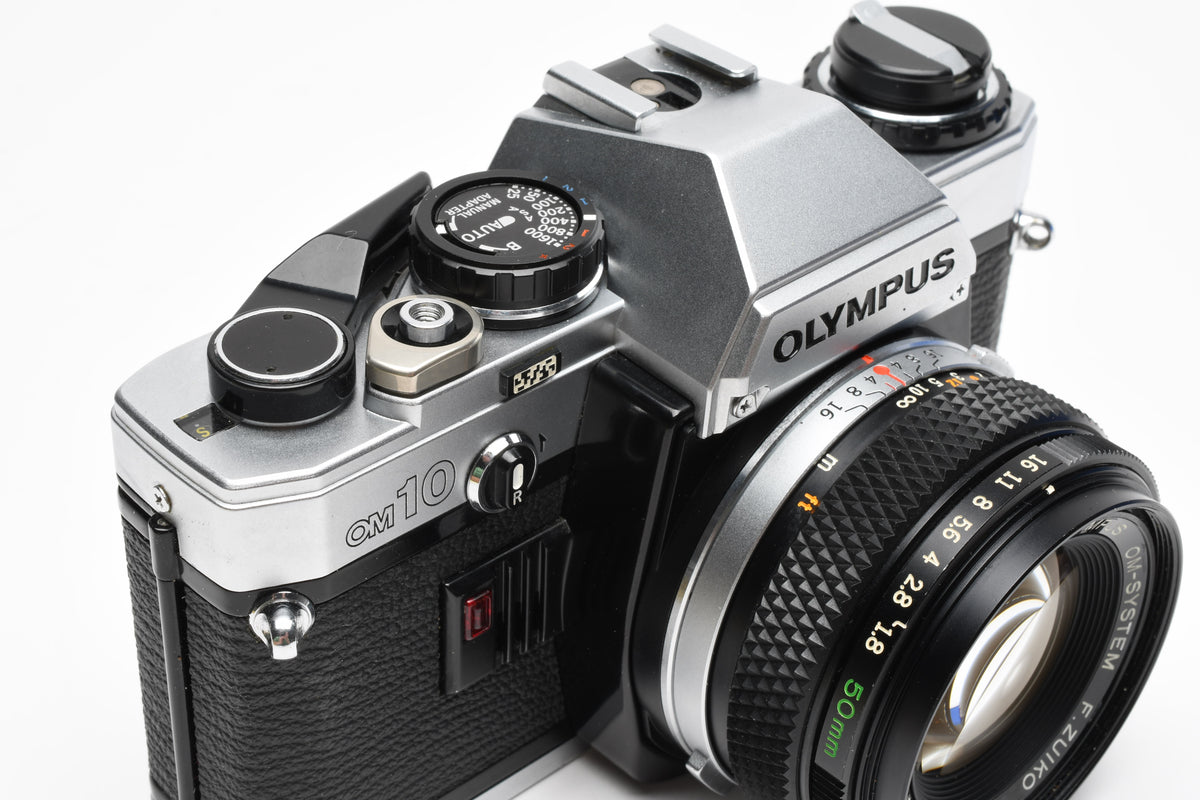 Olympus OM10 35mm SLR Body w/50mm f1.8 lens, Case, New seals, Great!