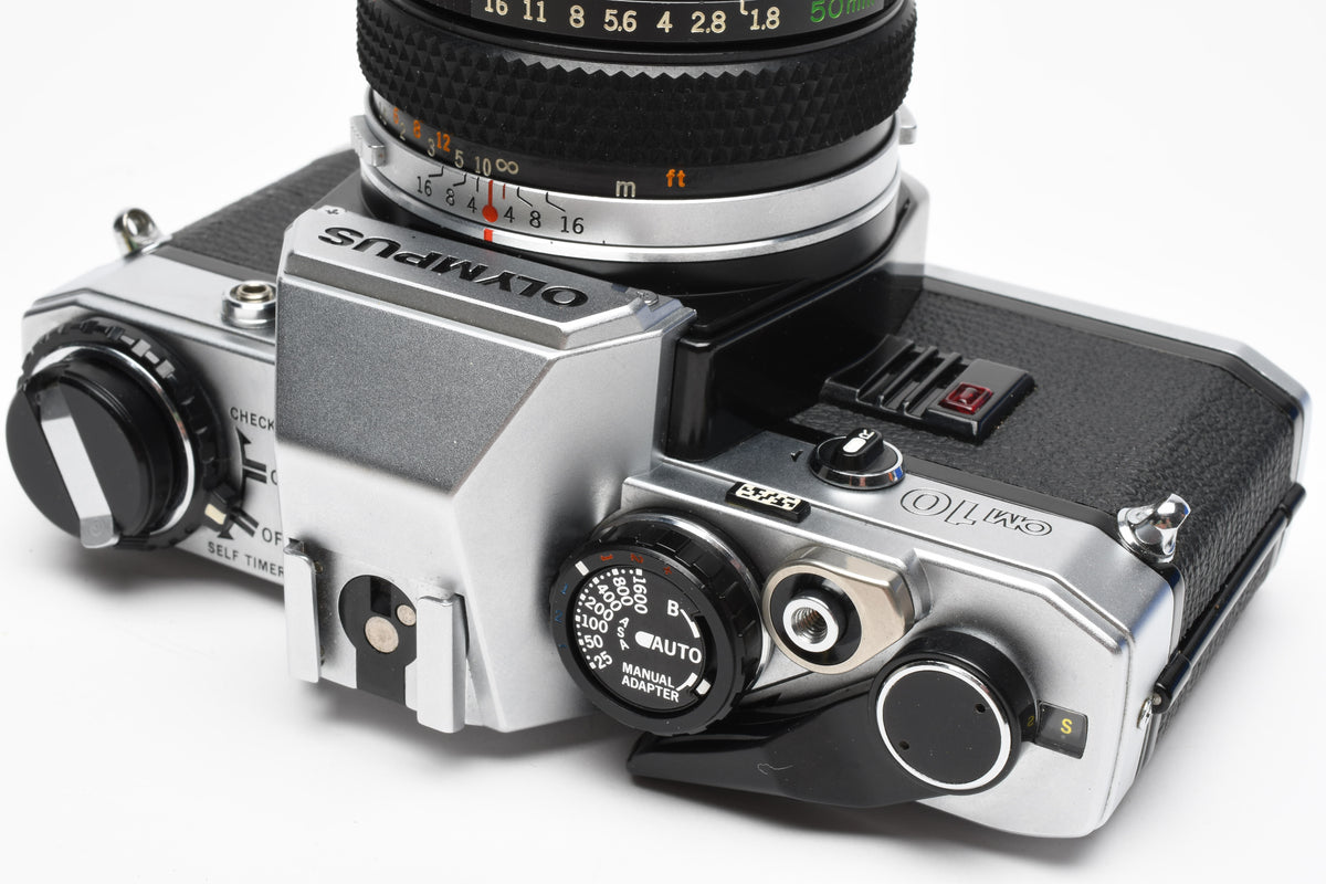 Olympus OM10 35mm SLR Body w/50mm f1.8 lens, Case, New seals, Great!