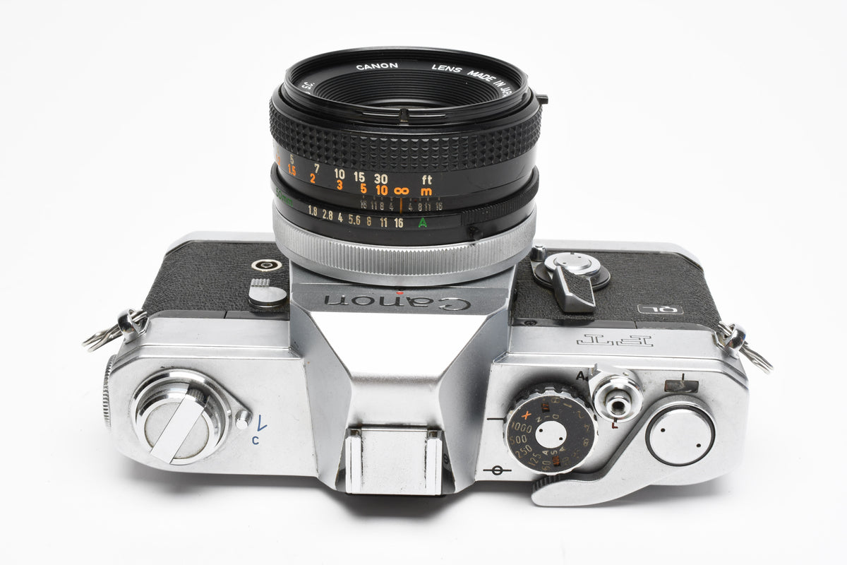 Canon FT QL 35mm SLR w/FL 50mm f1.8 lens, New seals, Case, Tested, Great!