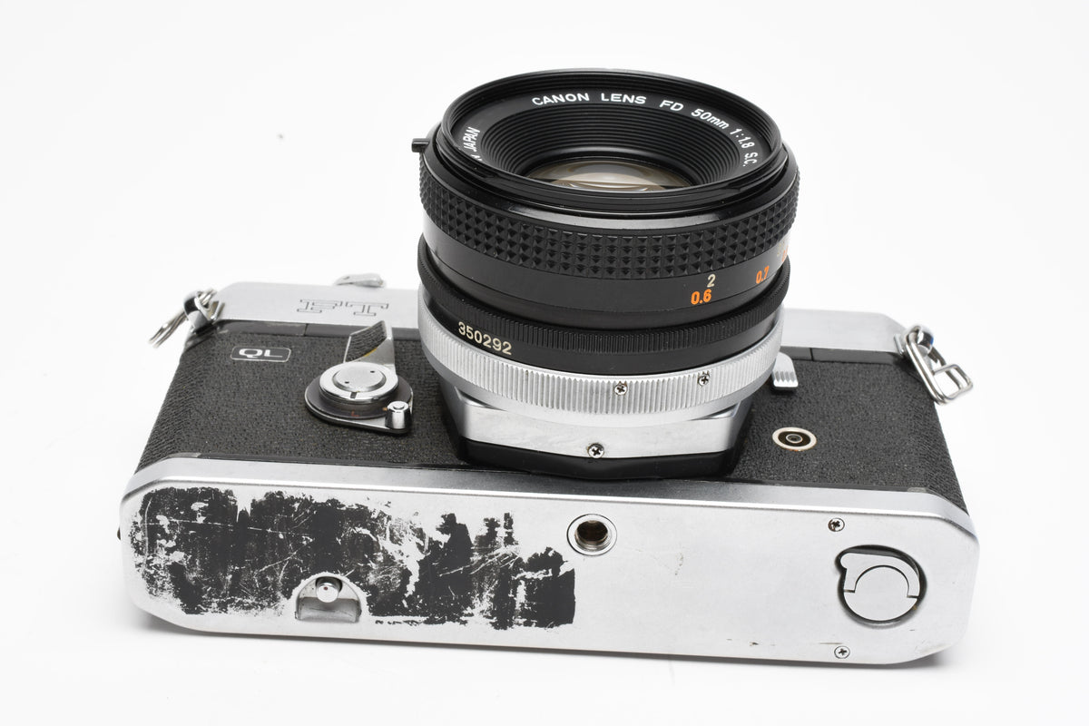 Canon FT QL 35mm SLR w/FL 50mm f1.8 lens, New seals, Case, Tested, Great!