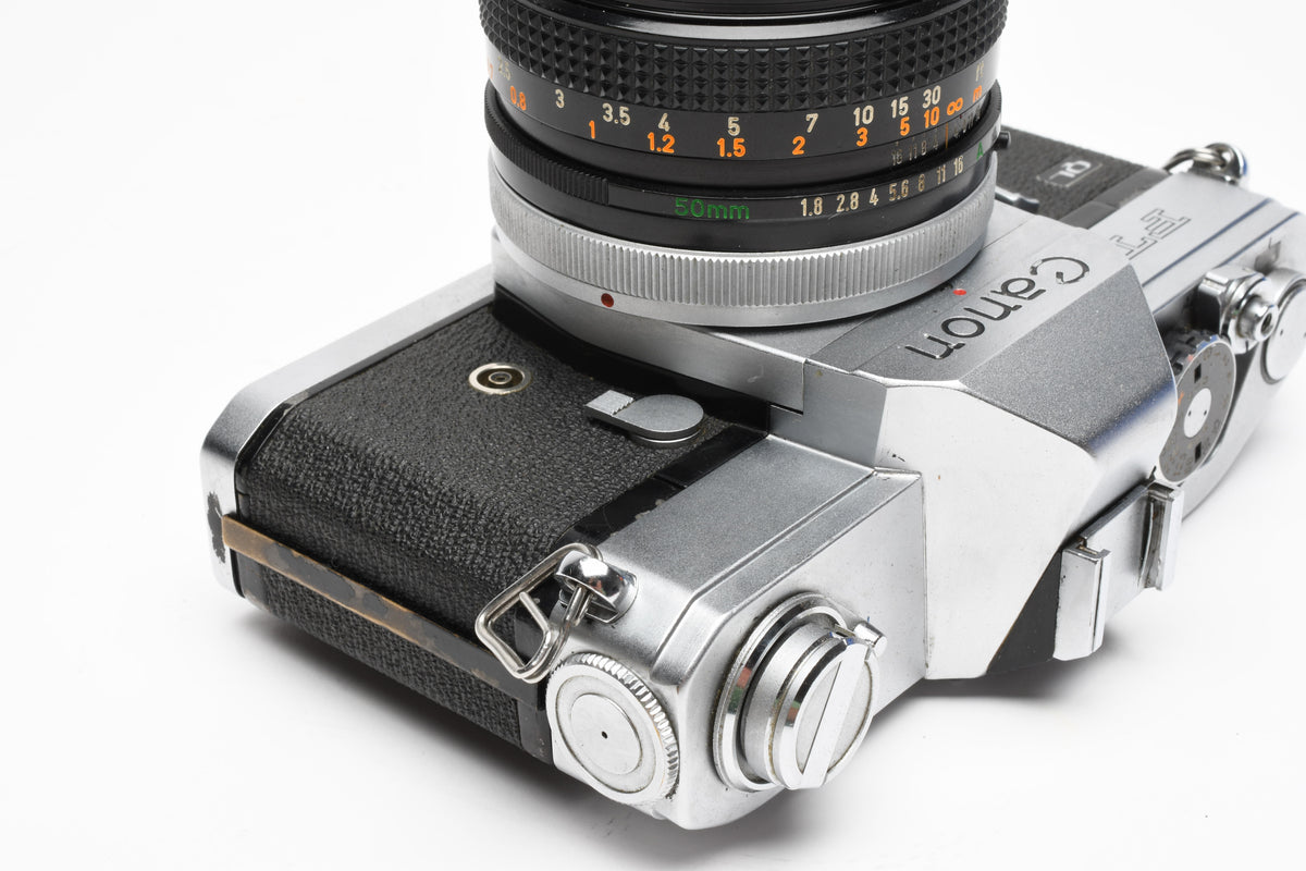 Canon FT QL 35mm SLR w/FL 50mm f1.8 lens, New seals, Case, Tested, Great!