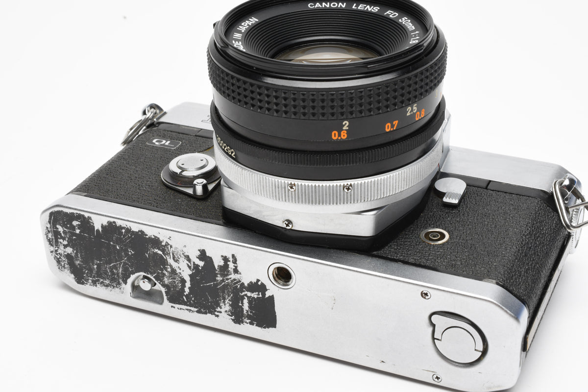 Canon FT QL 35mm SLR w/FL 50mm f1.8 lens, New seals, Case, Tested, Great!