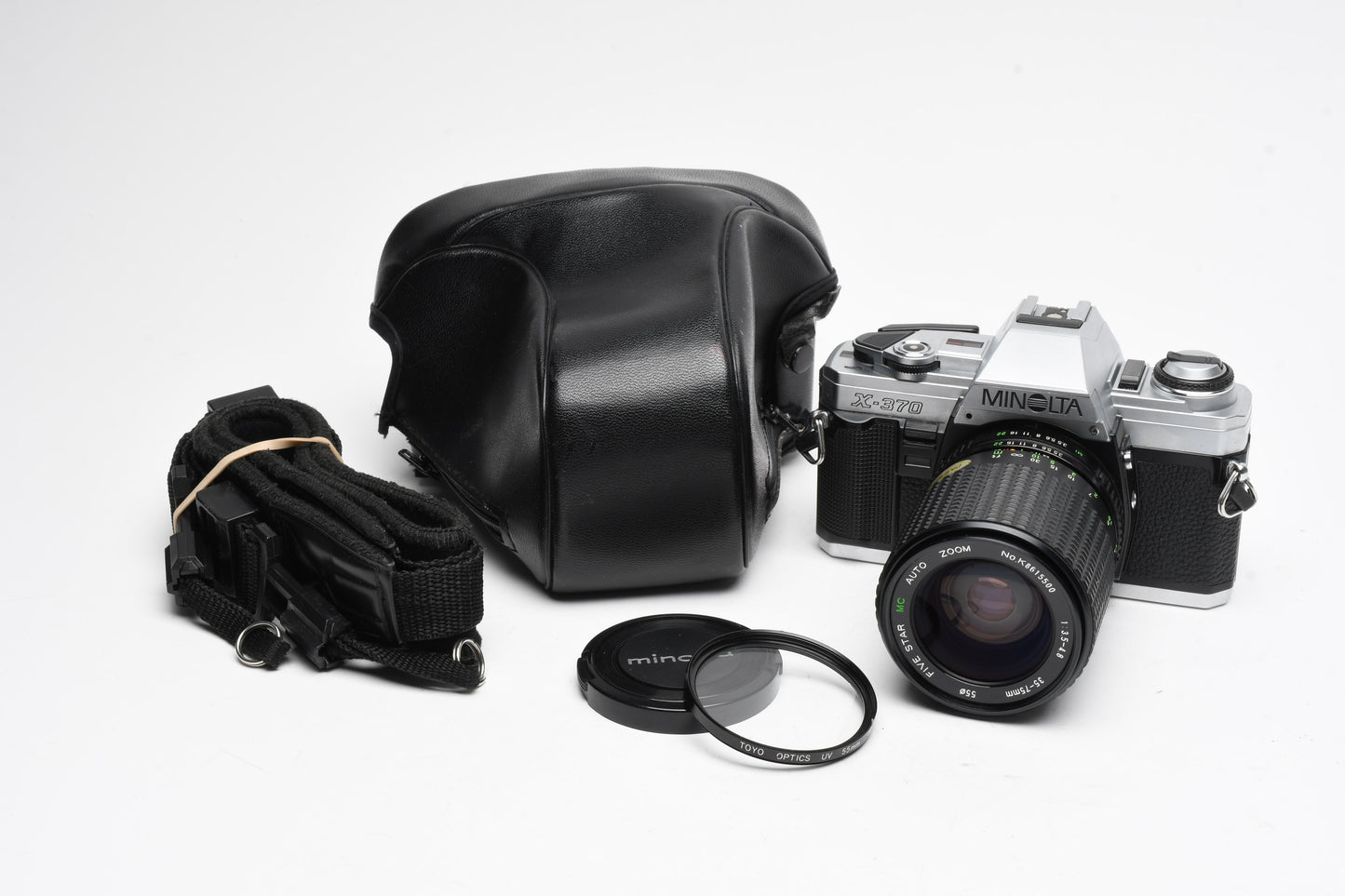Minolta X370 35mm SLR w/35-75mm zoom, case, strap, tested