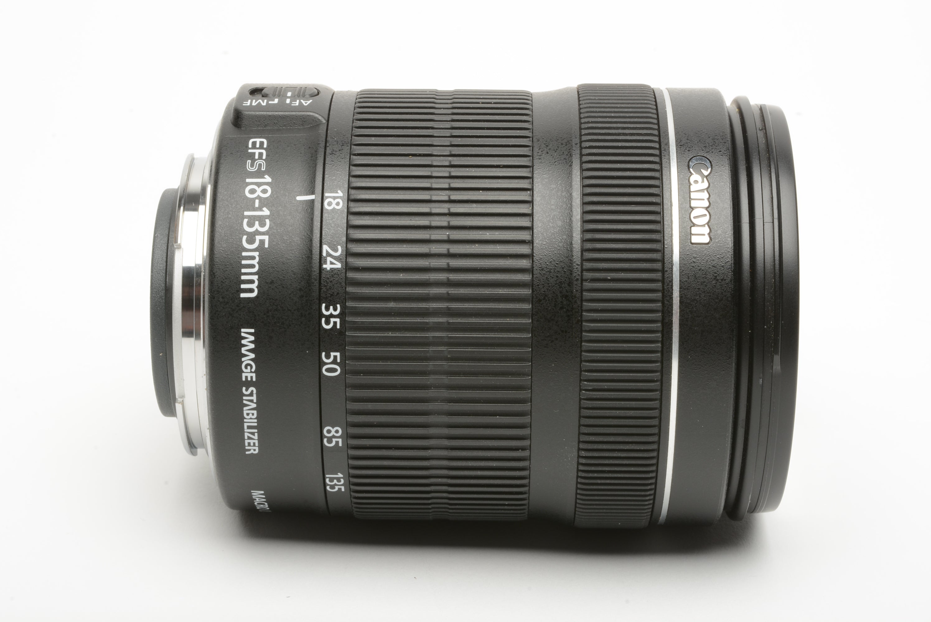 Canon EF-S 18-135mm f3.5-5.6 IS STM zoom lens, manual, UV + caps