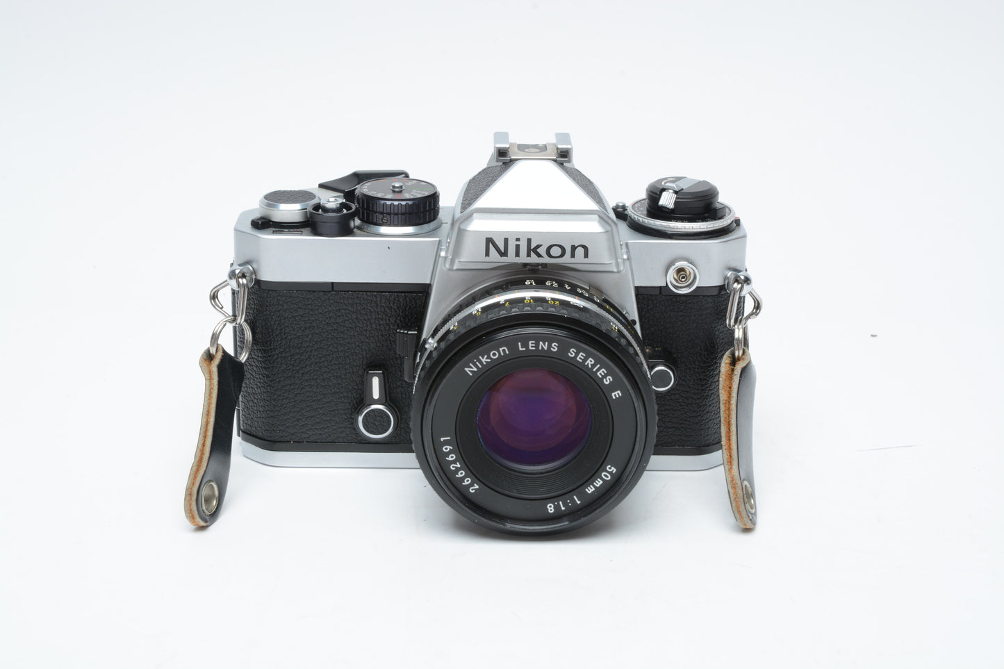 Nikon FE 35mm SLR w/50mm f1.8 E , Strap, New Seals, Case, Tested!