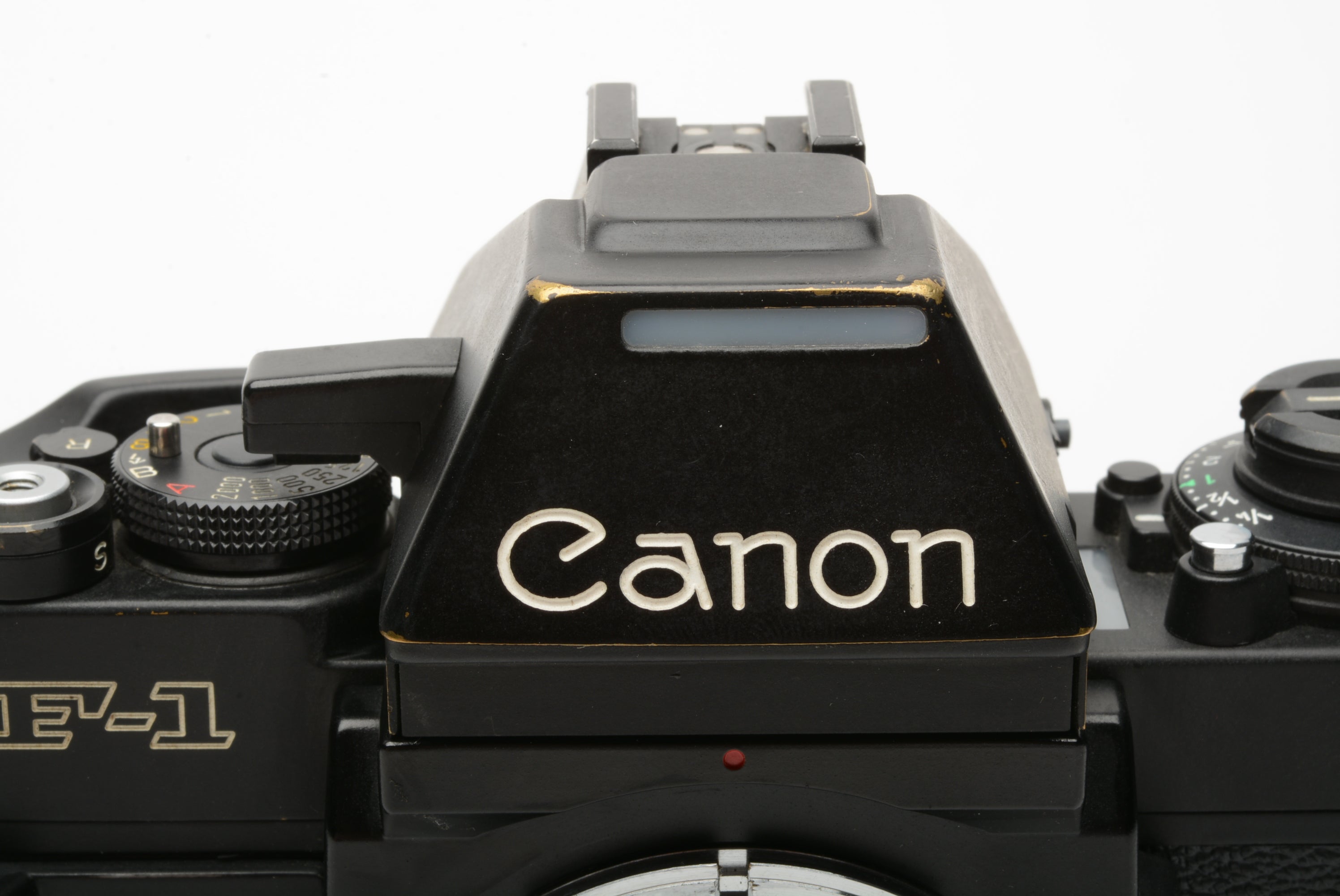 Canon "new" F F1 mm SLR Body w/AE Prism, body cap, brochure