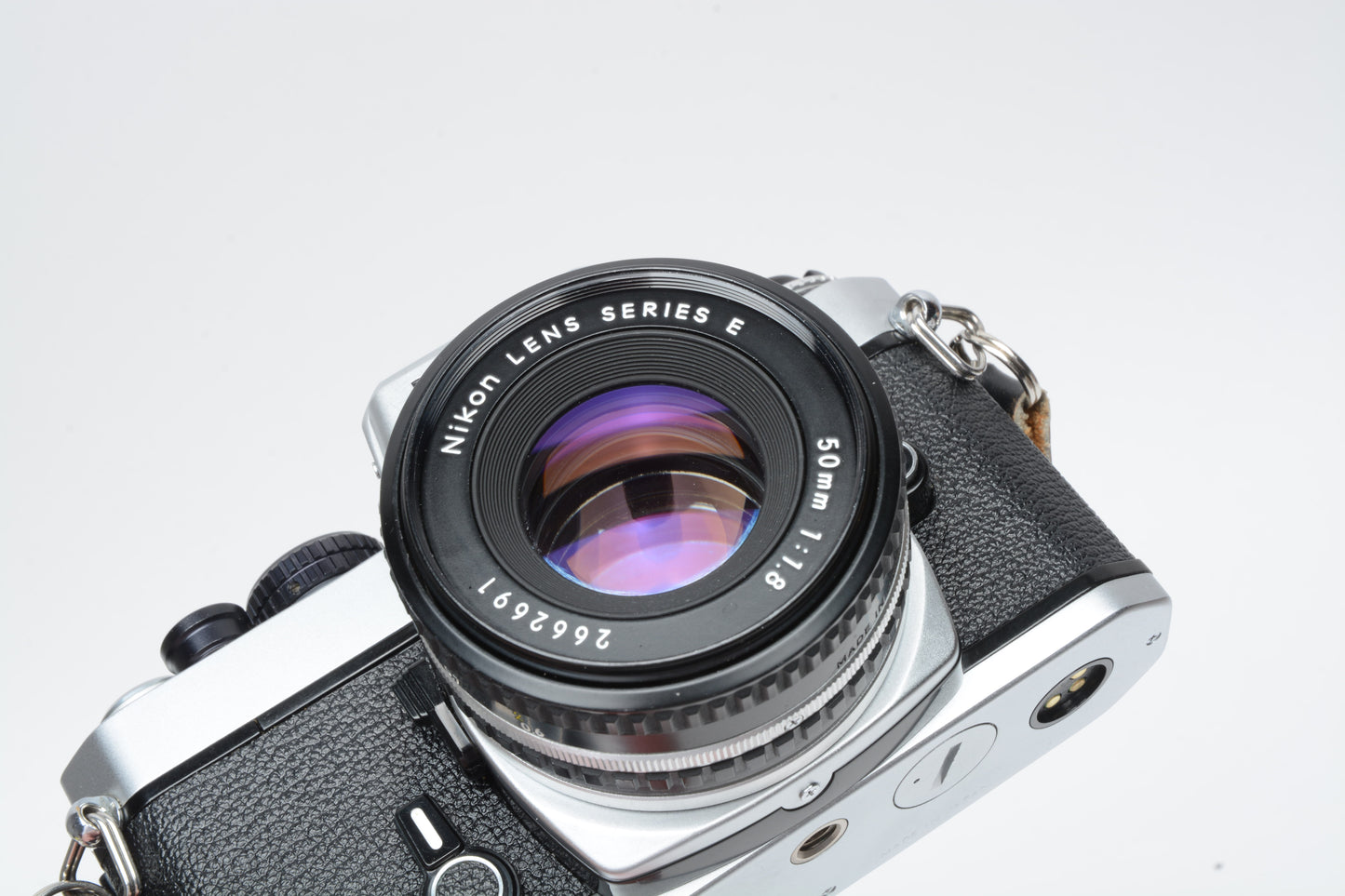 Nikon FE 35mm SLR w/50mm f1.8 E , Strap, New Seals, Case, Tested!