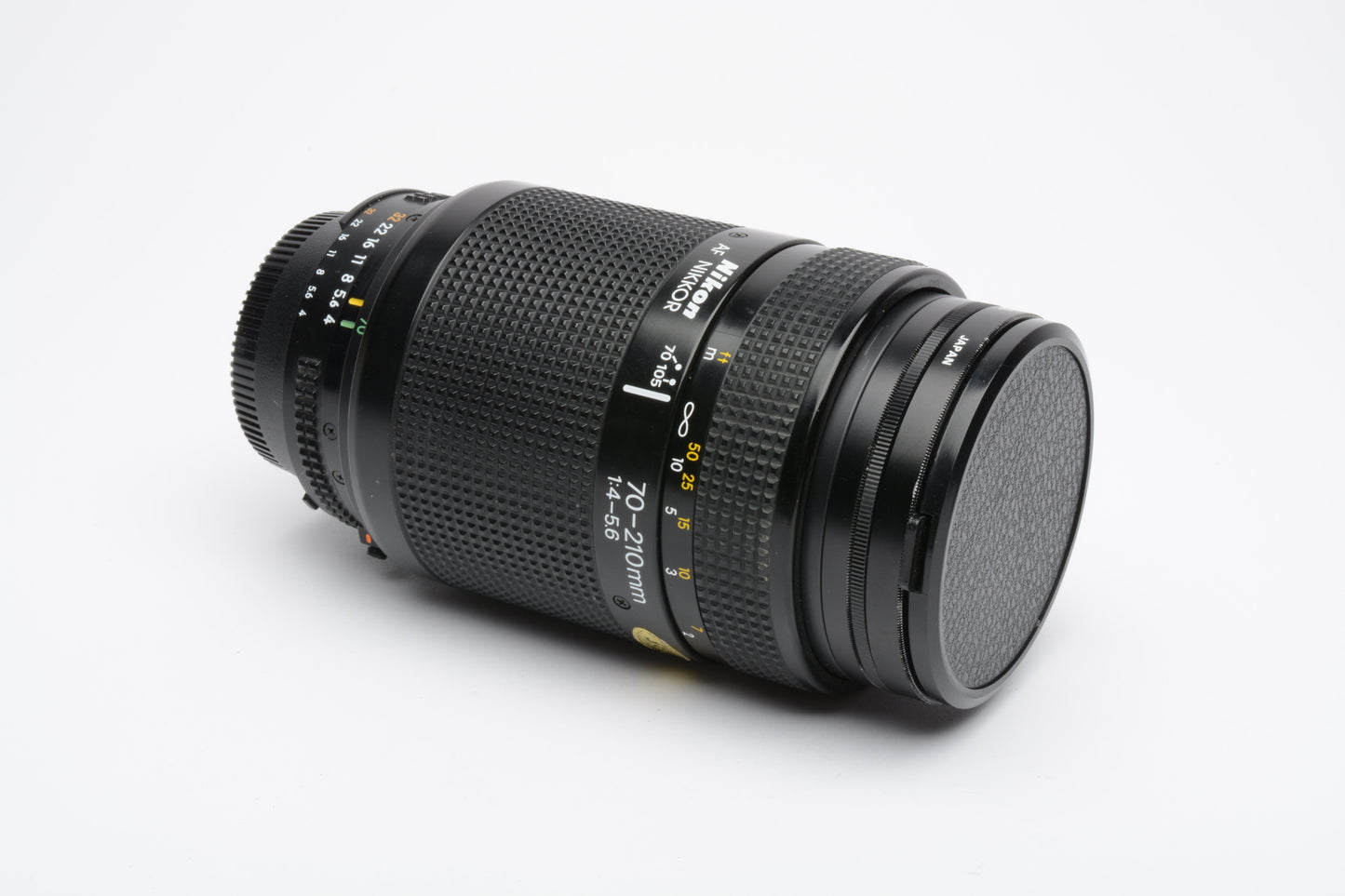 Nikon AF Nikkor 70-210mm F4-5.6 zoom lens, caps + C. Pol filter