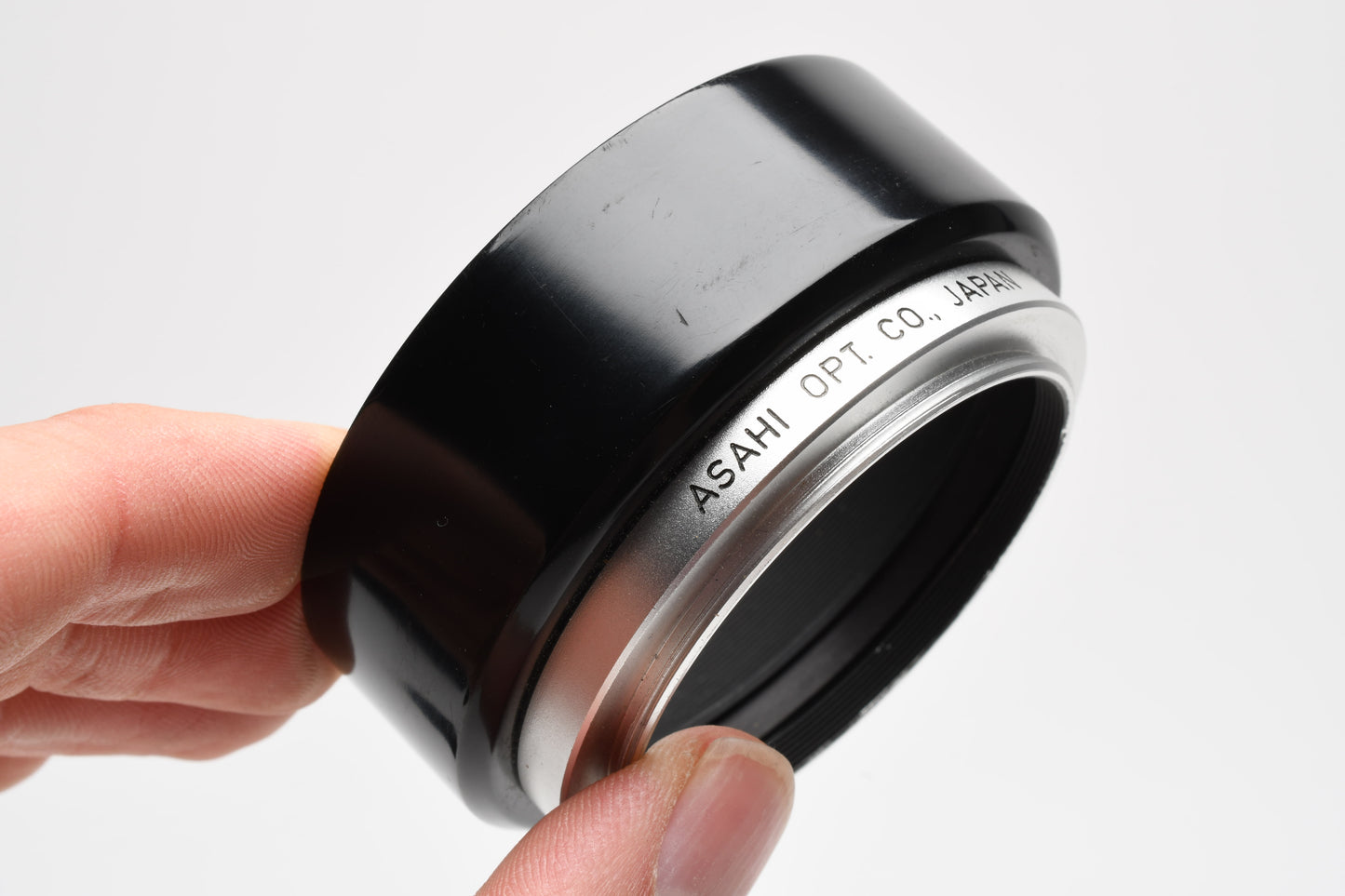 Asahi Pentax Plastic lens hood w/metal rim for 50mm lenses in case