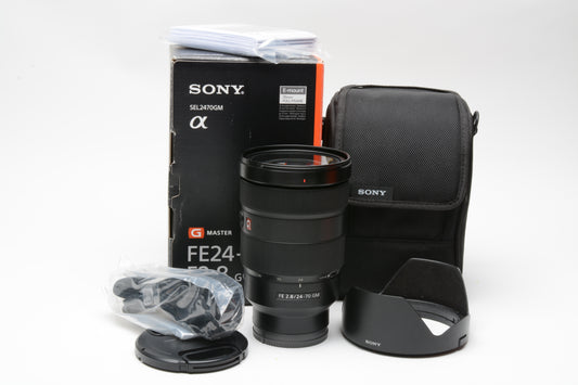 Sony FE 24-70mm f2.8 GM lens, case, hood, caps + strap, clean, sharp, boxed