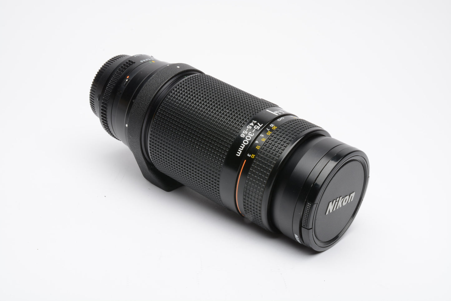 Nikon AF Nikkor 75-300mm f4.5-5.6 zoom lens, caps, collar, UV, very nice