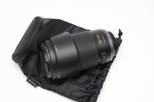 Panasonic Lumix G Vario 100-300mm f4-5.6 Mega O.I.S Lens, UV, Hood, Pouch, Mint-