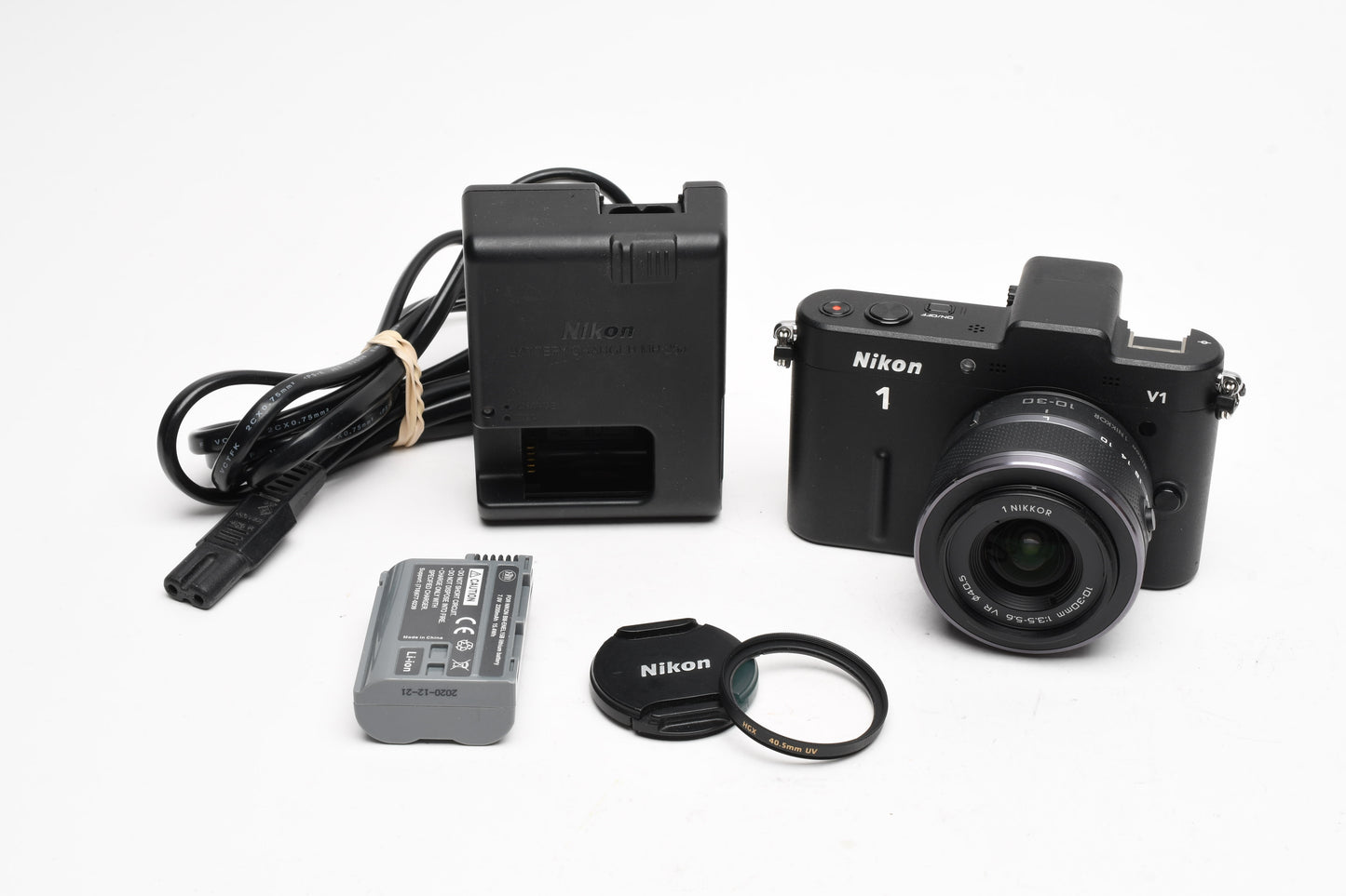 Nikon 1 V1 Mirrorless Camera w/Nikkor 10-30mm lens, UV, batt+charger, Mint-