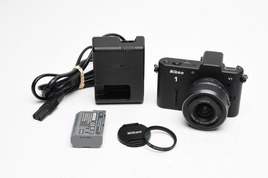 Nikon 1 V1 Mirrorless Camera w/Nikkor 10-30mm lens, UV, batt+charger, Mint-