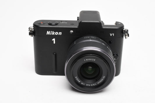 Nikon 1 V1 Mirrorless Camera w/Nikkor 10-30mm lens, UV, batt+charger, Mint-