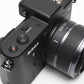 Nikon 1 V1 Mirrorless Camera w/Nikkor 10-30mm lens, UV, batt+charger, Mint-